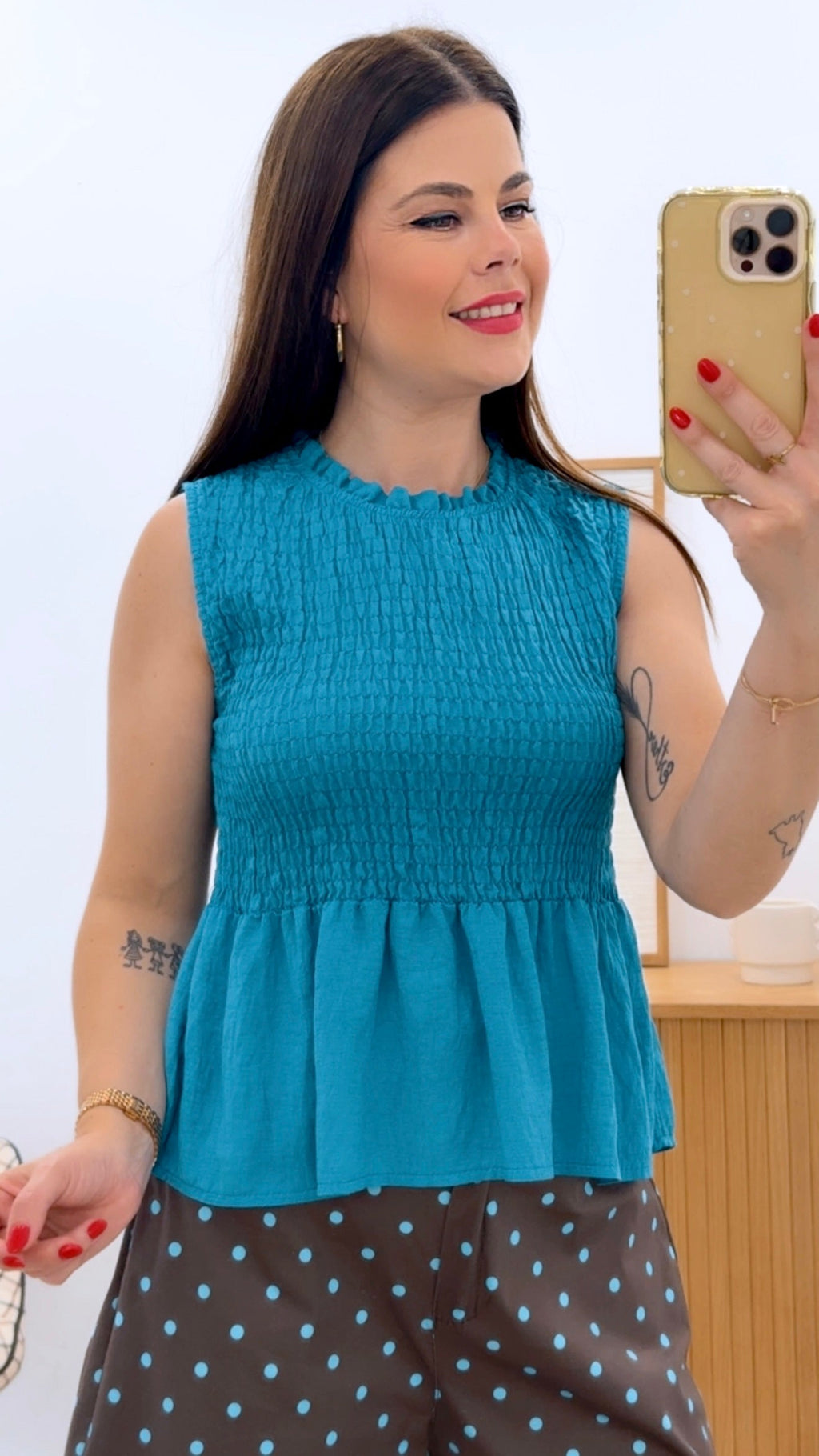 CAMISETA NIDO SIN MANGAS